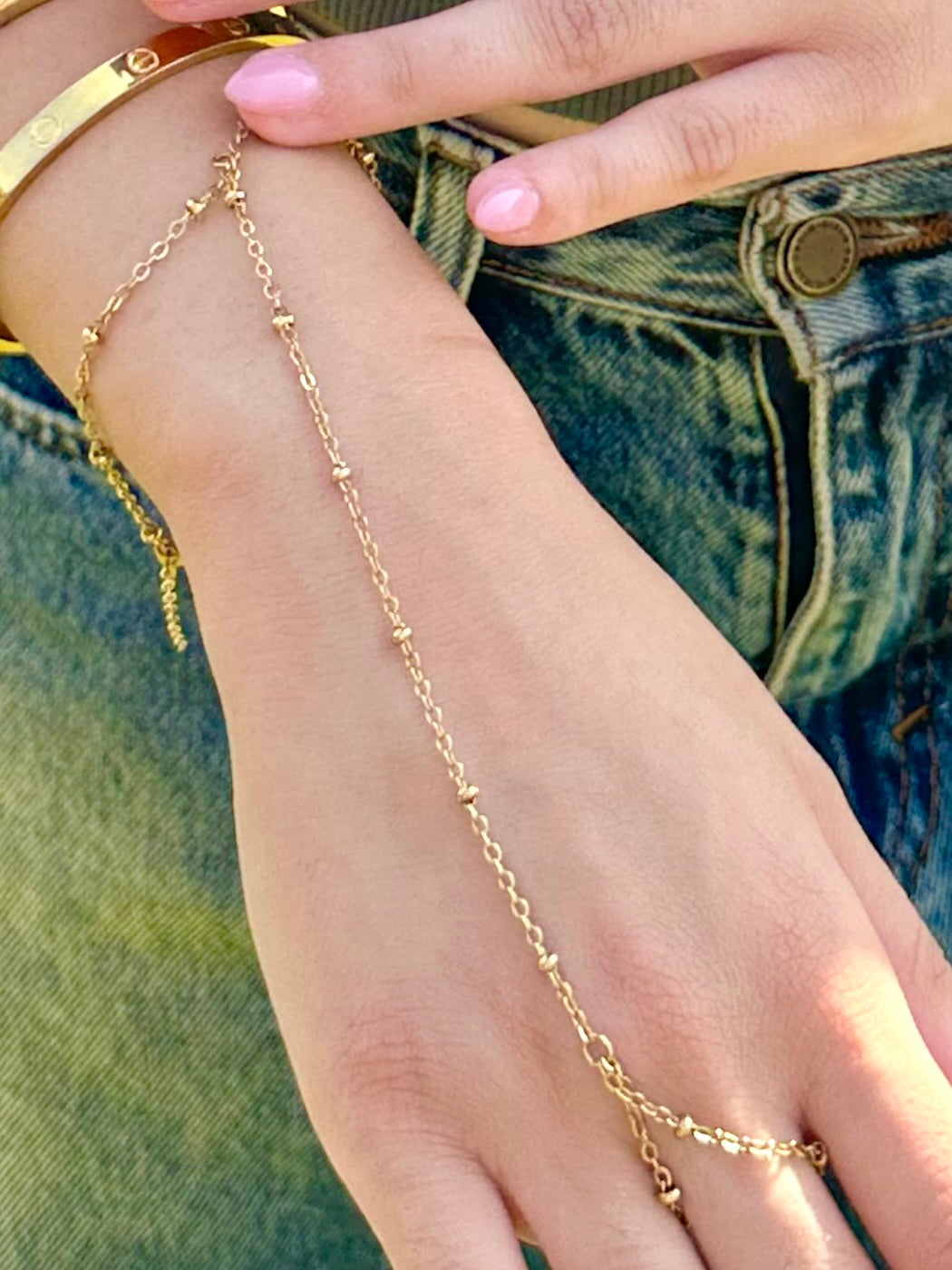 Gold studd handchain